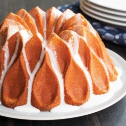 Nordic Ware Crown Bundt tulbandvorm ø 24 cm gietaluminium goudkleurig